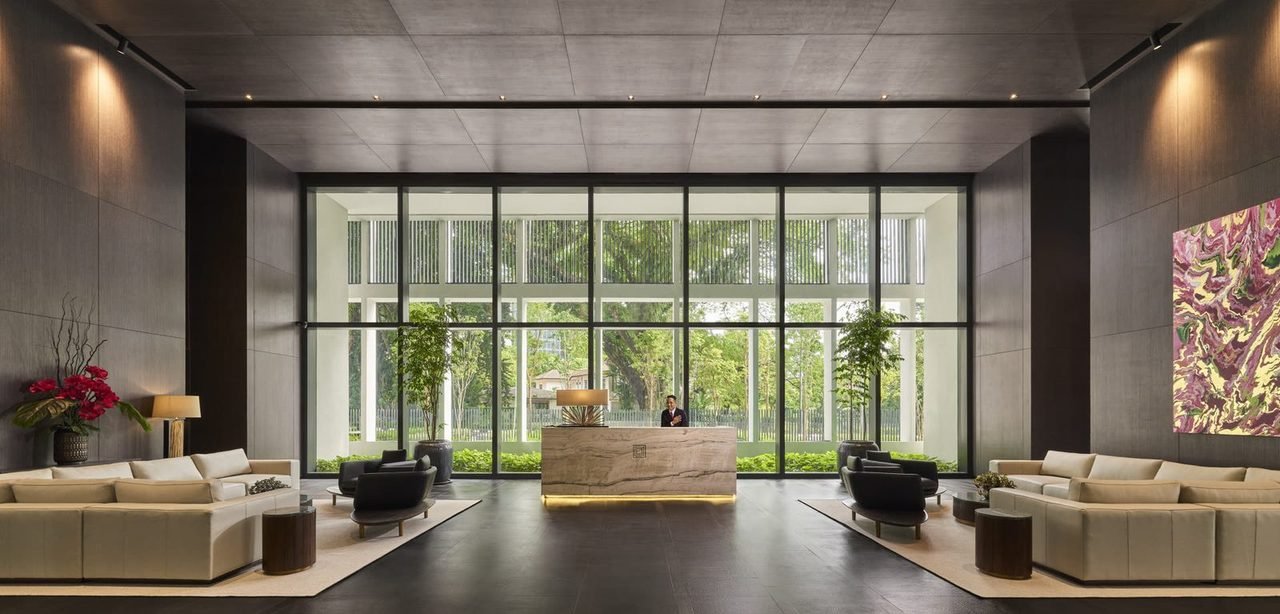 Conlay Signature Suites lobby lounge with reception