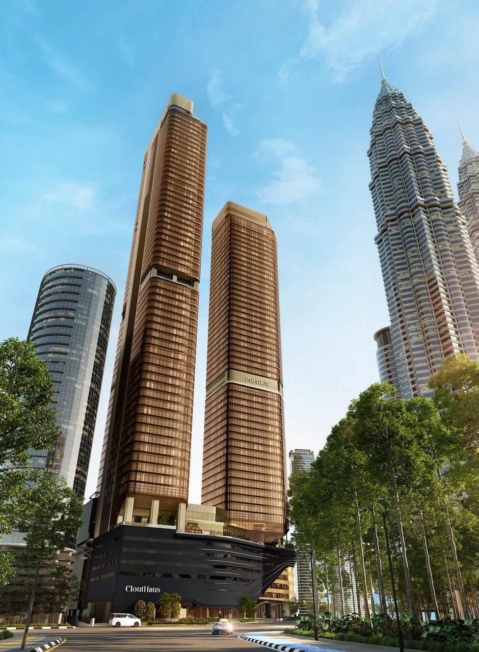 CloutHaus KLCC towers beside the Petronas Twin Towers